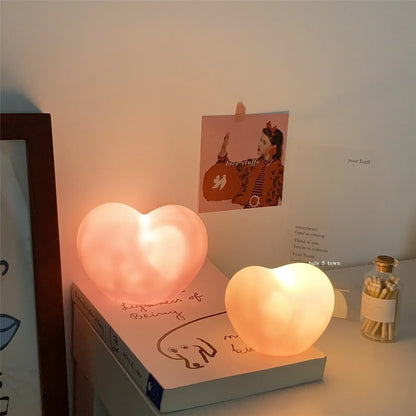 Vinyl atmosphere lamp in small or large size with warm glow, powered by batteries, available in white or pink colours
