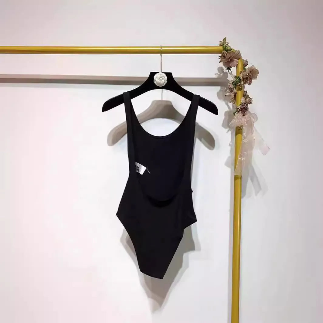 Backless sling jumpsuit for women, slim fit polyester, short 40cm length, black white khaki orange, sizes S M L