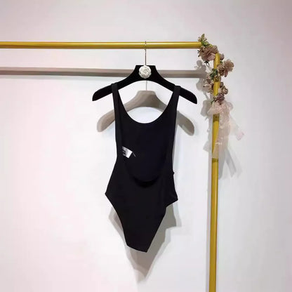 Backless sling jumpsuit for women, slim fit polyester, short 40cm length, black white khaki orange, sizes S M L