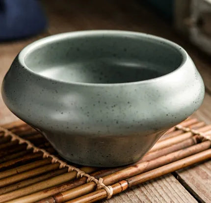 A tall porcelain soup bowl with a Japanese-inspired underglaze pattern, suitable for noodles and microwave use.