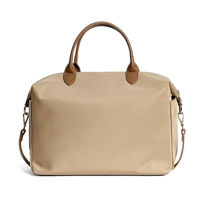 Nylon waterproof cloth shoulder bag with leather details in black or light khaki colour, 35x14x27cm dimensions