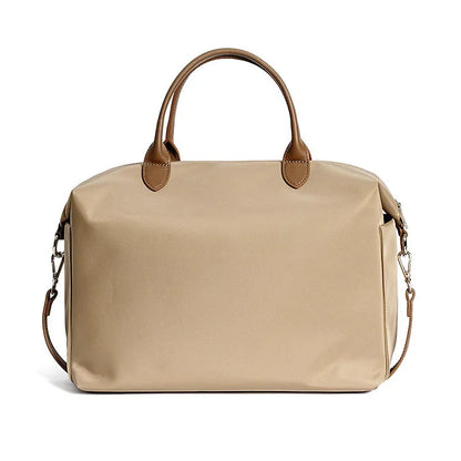 Nylon waterproof cloth shoulder bag with leather details in black or light khaki colour, 35x14x27cm dimensions
