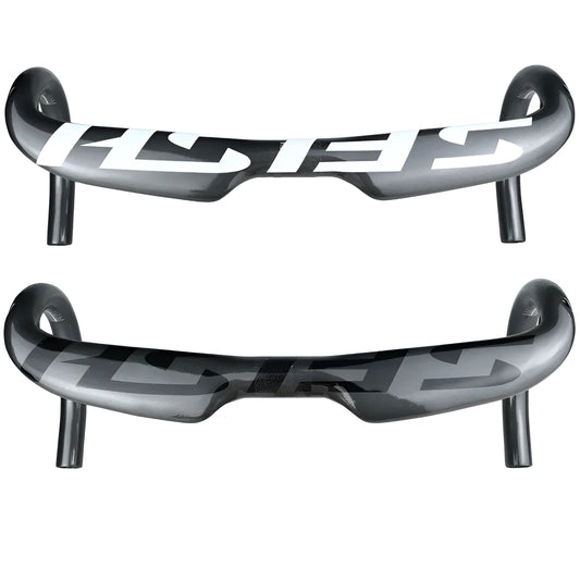 Carbon fibre road bicycle handlebar with ergonomic bent shape, shown in a choice of finishes.