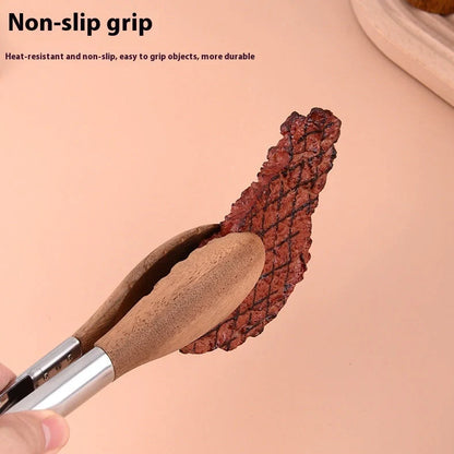 Stainless steel barbecue food tong with wood handle showing clamp mechanism and length measurement