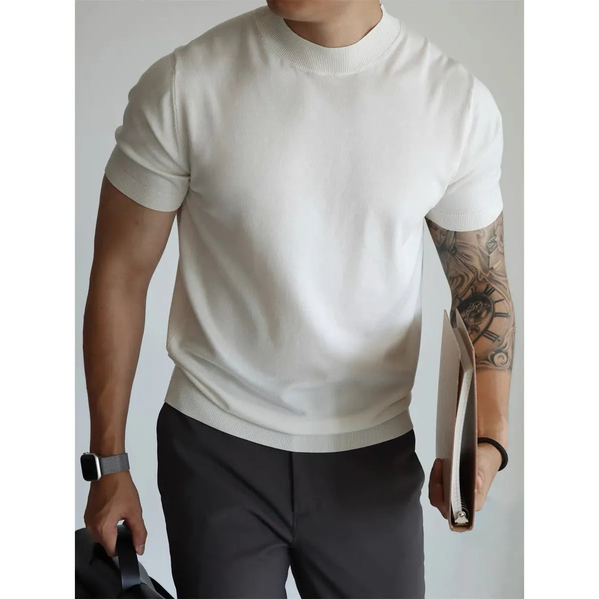 Men's slim-fit solid colour t-shirt in breathable polyester knitwear, shown in multiple colour options.