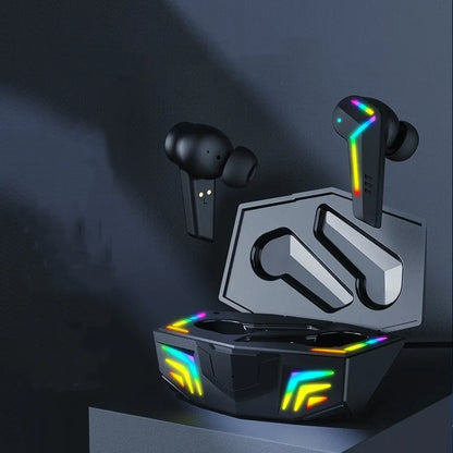 Small black Bluetooth headset with earplug design showing 15m range and low latency for gaming