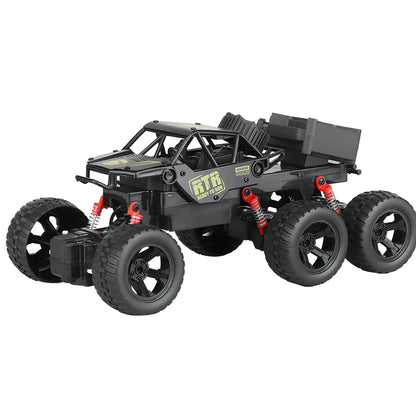 Children's remote control car with six wheels and 38cm climbing capability in black, gold, or red colours