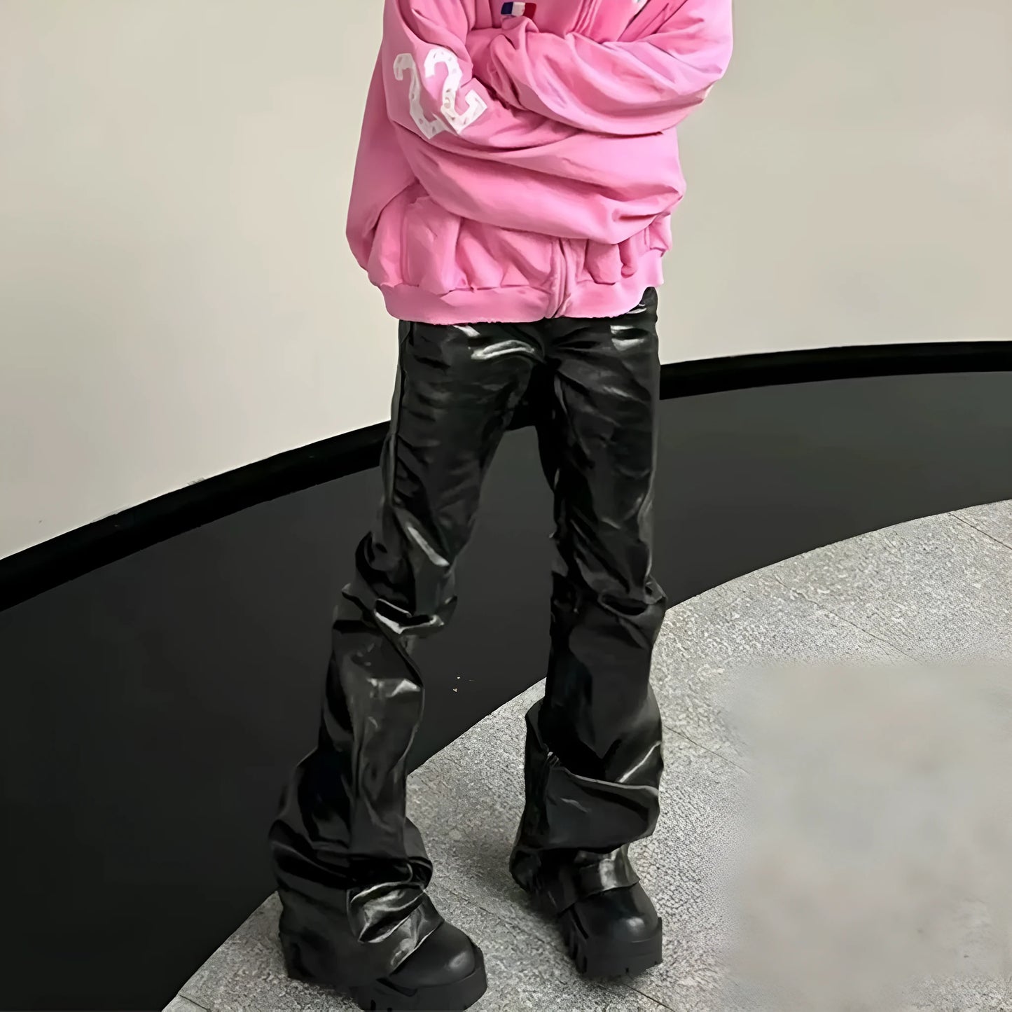 Black patent leather finish skinny jeans with straight leg cut on cotton denim