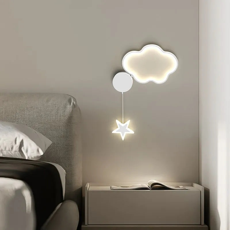 Black five-pointed star shaped children's wall lamp with a left-facing cloud design and touch control for three colour LED light.