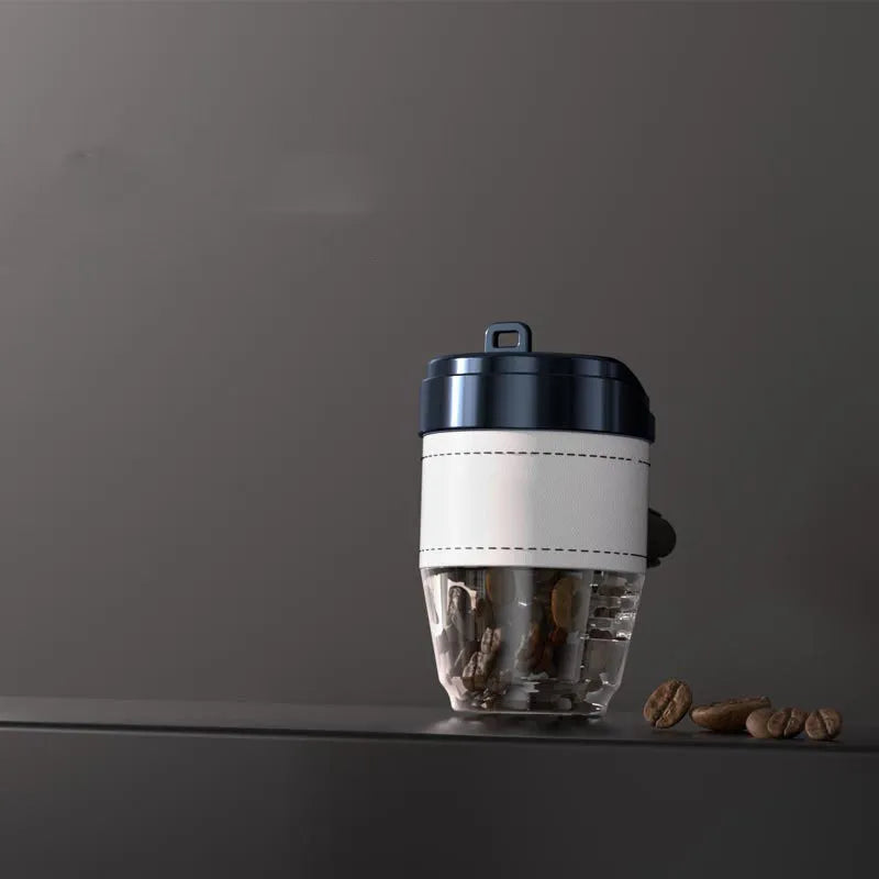 Brown plastic coffee cup-shaped solid car air freshener for dashboard odour removal.
