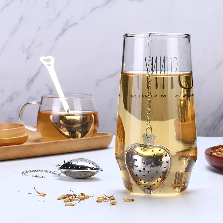 Premium stainless steel tea infuser with heart-shaped design, suitable for brewing loose-leaf teas, herbs, and spices