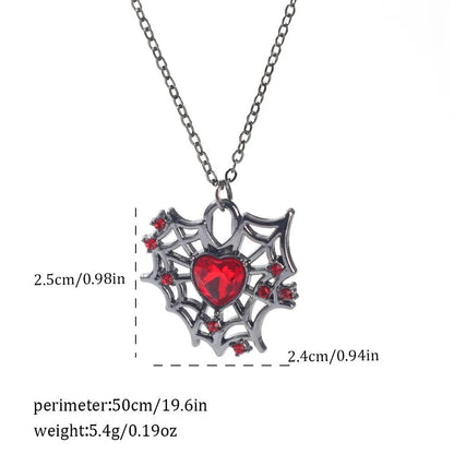 Gothic style zinc alloy necklace with bat pendant on a silver chain against dark background.