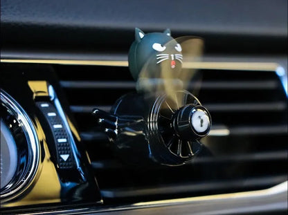 Set of four animal-themed car air vent clip ornaments: black husky, black cat, pink cat, and pink duck.