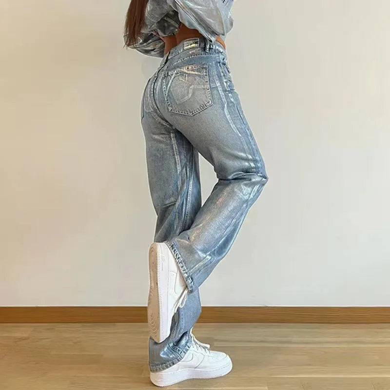 Blue straight-leg high-waist jeans with hot silver contrast detailing on denim fabric