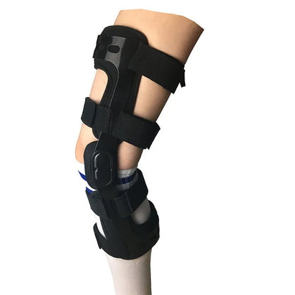 Black anterior ligament knee supporter with adjustable strap, shown on a knee.