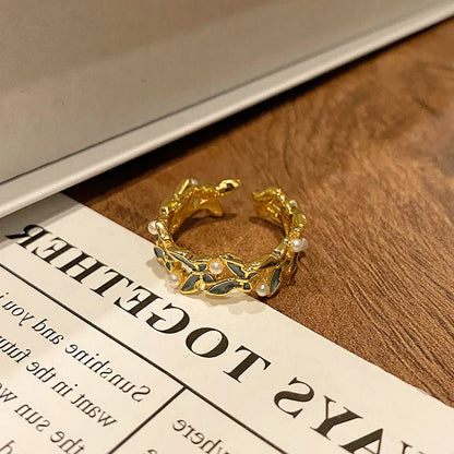 Copper women's ring with Chinese butterfly design and adjustable open loop.