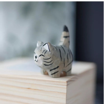 Handmade wooden cat trinkets in gray and orange, perfect for decor or gifts