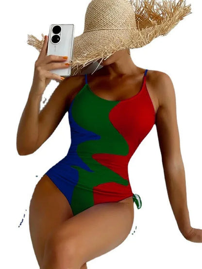 A blue one-piece swimsuit for women, showing sleeveless and backless design on a mannequin.