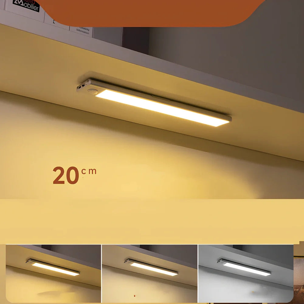 Silver LED inductive light strip, 40cm length, attached to shoe cabinet shelf with 3M adhesive