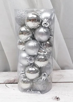 Assortment of 3cm diameter gold, red, silver, and blue barrel-shaped Christmas baubles with an electroplated finish.