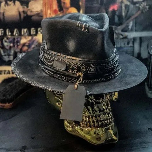Handmade wool felt skull hat with conical crown design, showing textured surface and distinctive silhouette