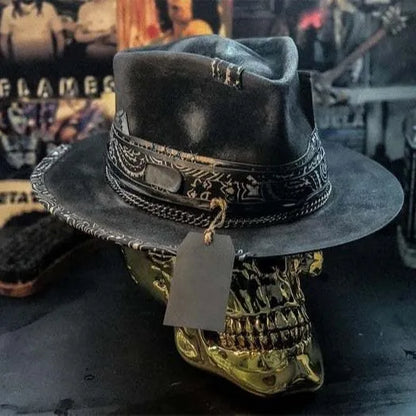 Handmade wool felt skull hat with conical crown design, showing textured surface and distinctive silhouette