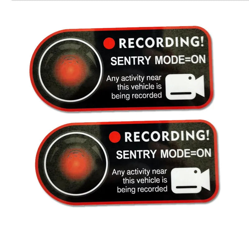 Tesla Sentry Mode electrostatic warning sticker measuring 11cm by 5cm with English security text