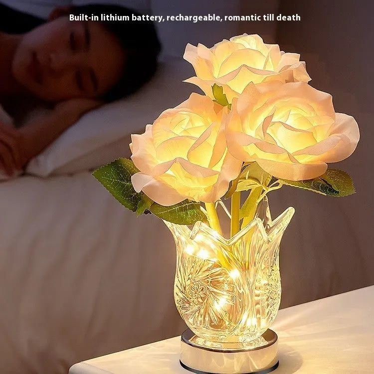 Modern crystal flowers design rechargeable touch table lamp with dimming control on a bedside table.