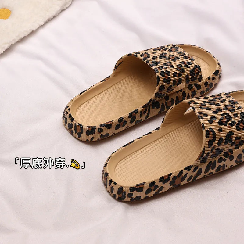 Women's leopard print slippers with a thick EVA sole in multiple colour options on a white background.