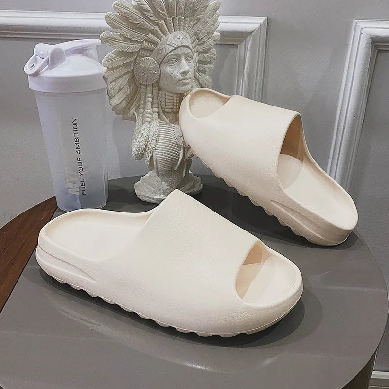 Women's thick sole beach slippers in EVA material, shown in available colours black, green, brown, and beige.