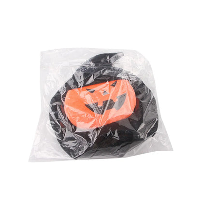 Dog wearing Halloween costume in ghost or pumpkin ghost design made from PP cotton
