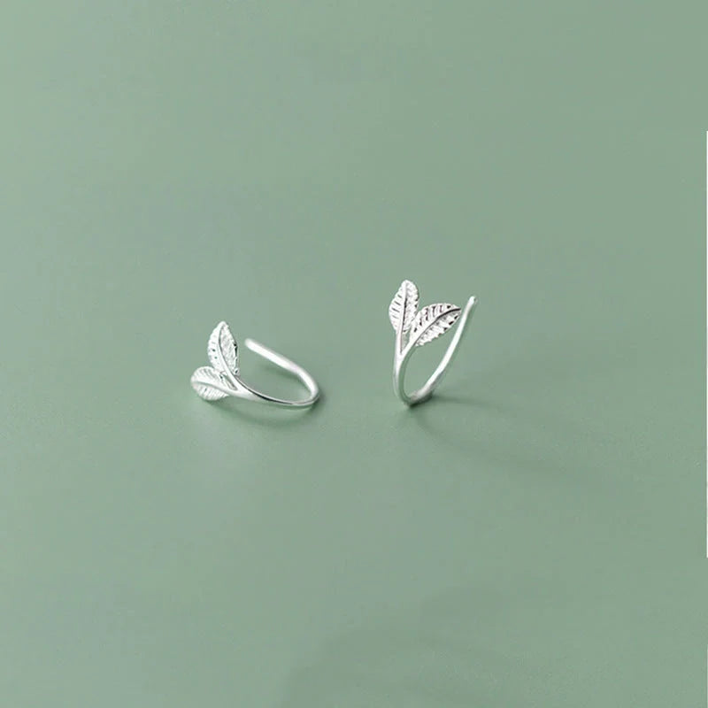 Handmade S925 sterling silver branch bud earrings in gold and white gold finishes.
