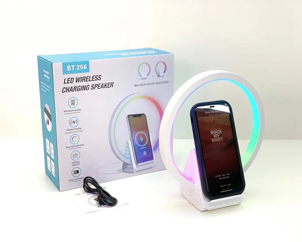 White wireless charging Bluetooth speaker with ambient lighting, compact rectangular design measuring 225mm x 200mm x 10mm