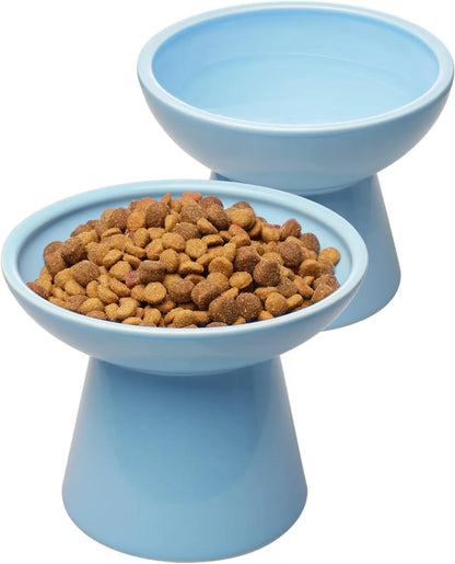 Elevated wide shallow ceramic cat food and water bowl in blue, green, pink, or white colour options.