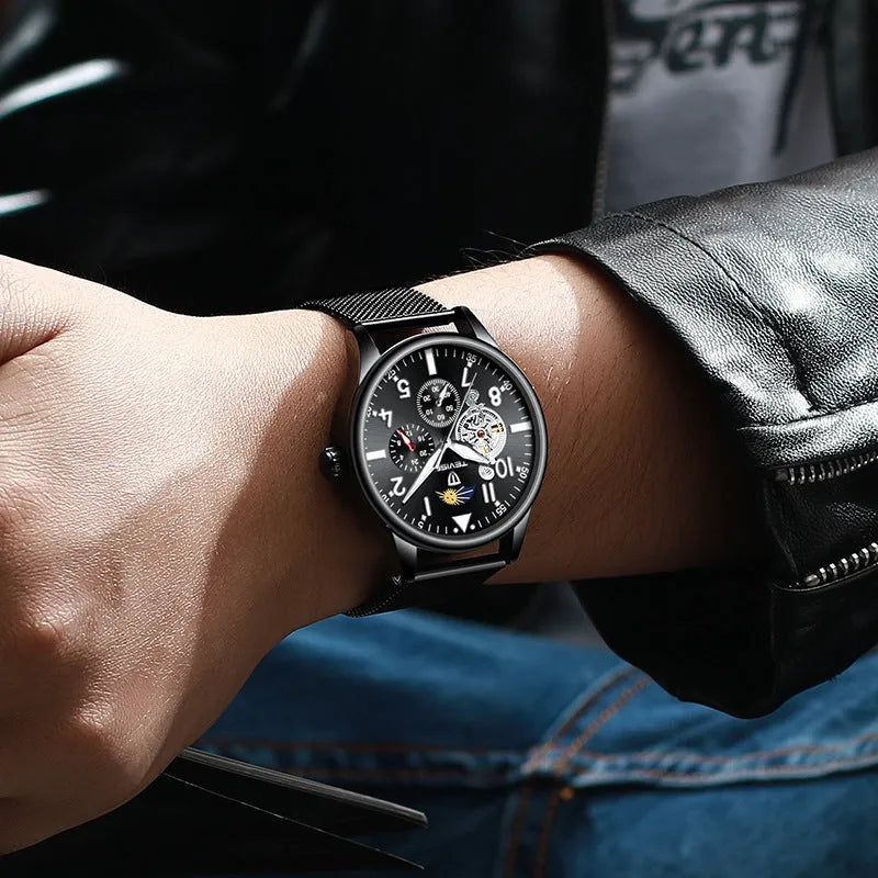 Men's black mechanical watch with moon phase indicator and luminous hands on alloy case