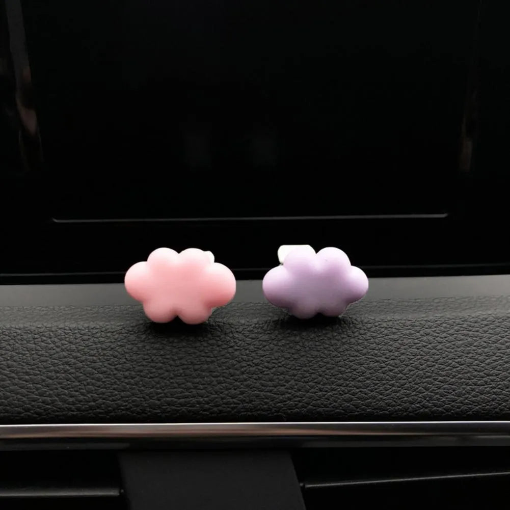 Resin car fragrance clip in light green colour showing 17mm x 27mm dimensions on car air vent