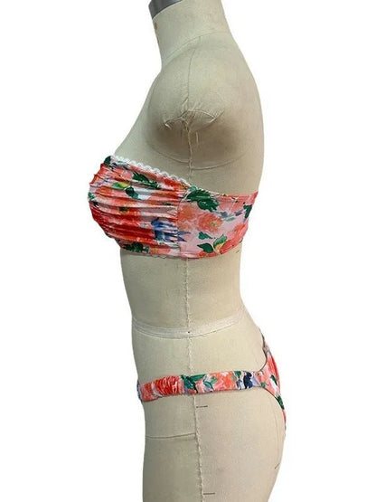 Colourful floral print tube top bikini set with lace trim on a mannequin