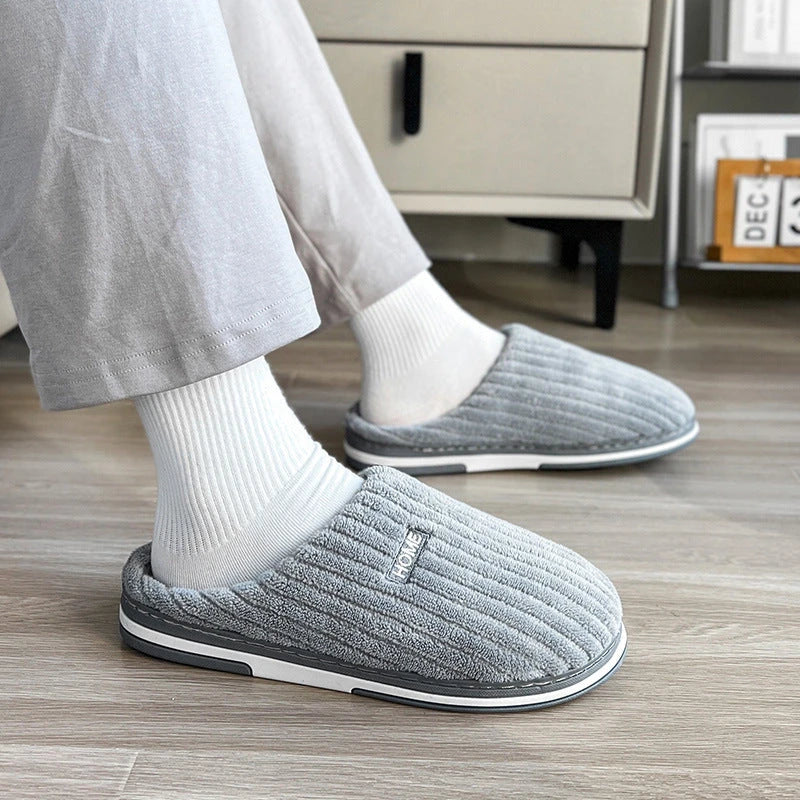 Cozy cotton slippers in various colors, featuring a soft, plush lining and non-slip rubber sole for indoor comfort and warmth