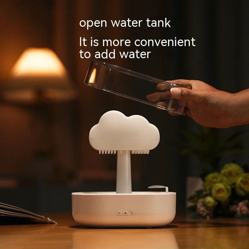 Soothing cloud-shaped humidifier with raindrop lights, aromatherapy diffuser, and sleep-promoting functions for a tranquil ambiance