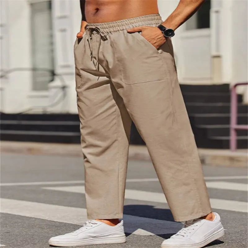 Men's straight-leg linen trousers in apricot colour with elastic waistband