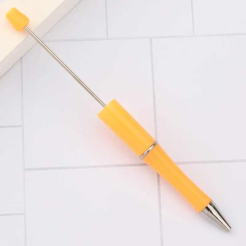 Rotating bead ballpoint pen in gradient colour with ABS plastic and steel wire construction