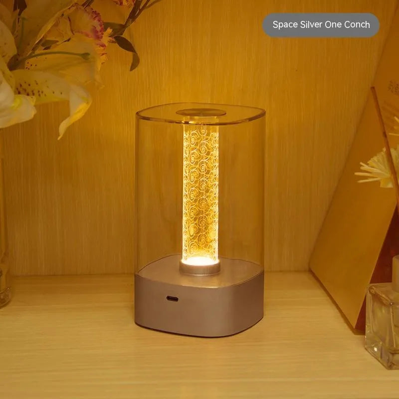 Rose Gold LED touch atmosphere lamp with abstract pattern on bedside table