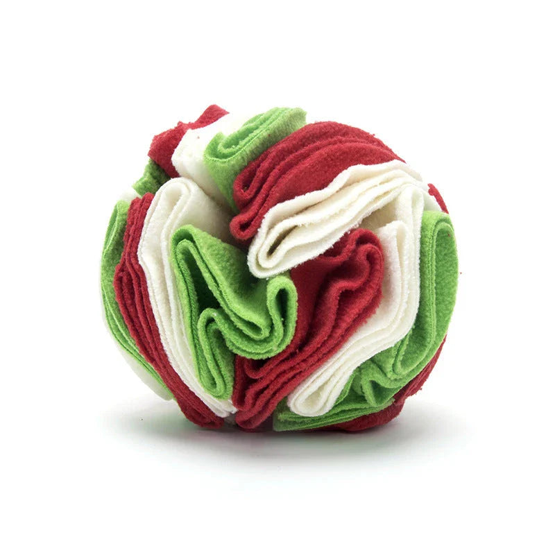 Soft and interactive puzzle ball toy made of polar fleece for dogs and cats to sniff and forage for hidden treats