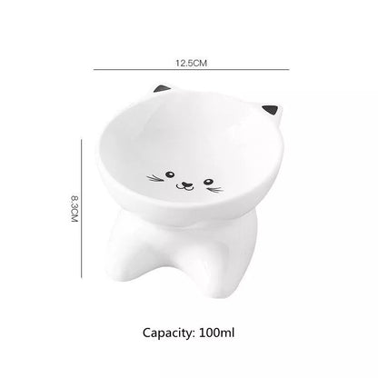 Ceramic pet food bowl with cat face design, easy to clean porcelain material