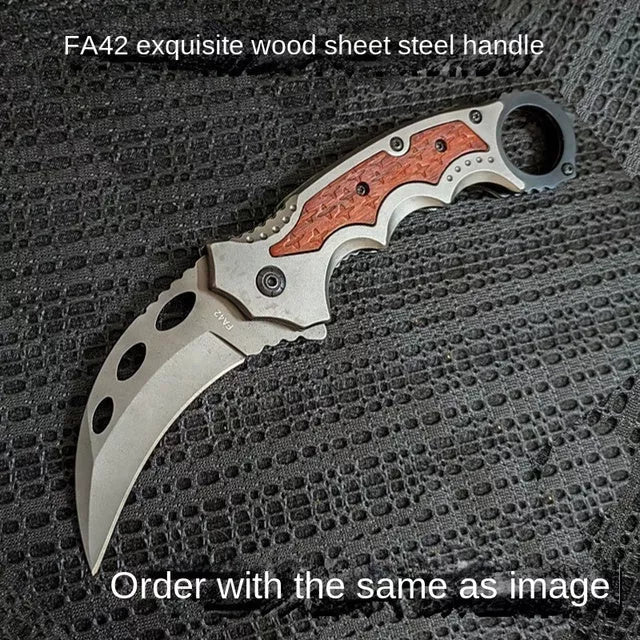 High hardness folding claw knife with grey titanium surface and sour branch wood handle