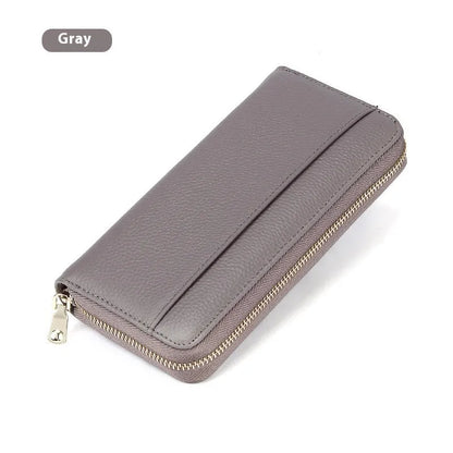 Long genuine leather women's wallet in solid colours with 12 card slots and anti-theft design