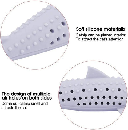 Green fish-shaped silicone cat chew toy with side holes, shown disassembled to reveal hollow interior for catnip.