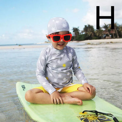 Boys' quick-dry swim trunks with vibrant prints, perfect for pool and beach