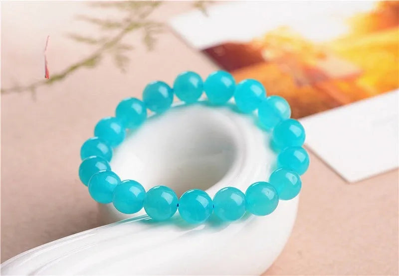 Natural blue-green Amazonite scattered beads in various sizes from 6mm to 13mm diameter for jewellery making