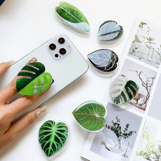 Stylish leaf-inspired smartphone stand with secure grip and adjustable viewing angle for hands-free use